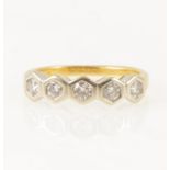 A diamond five stone ring.