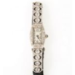 A lady's diamond set cocktail watch.