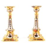 A pair of Royal Crown Derby silver-shape candlesticks, 1976