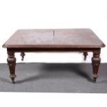 A Victorian mahogany extending dining table