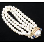 A three row cultured pearl bracelet.