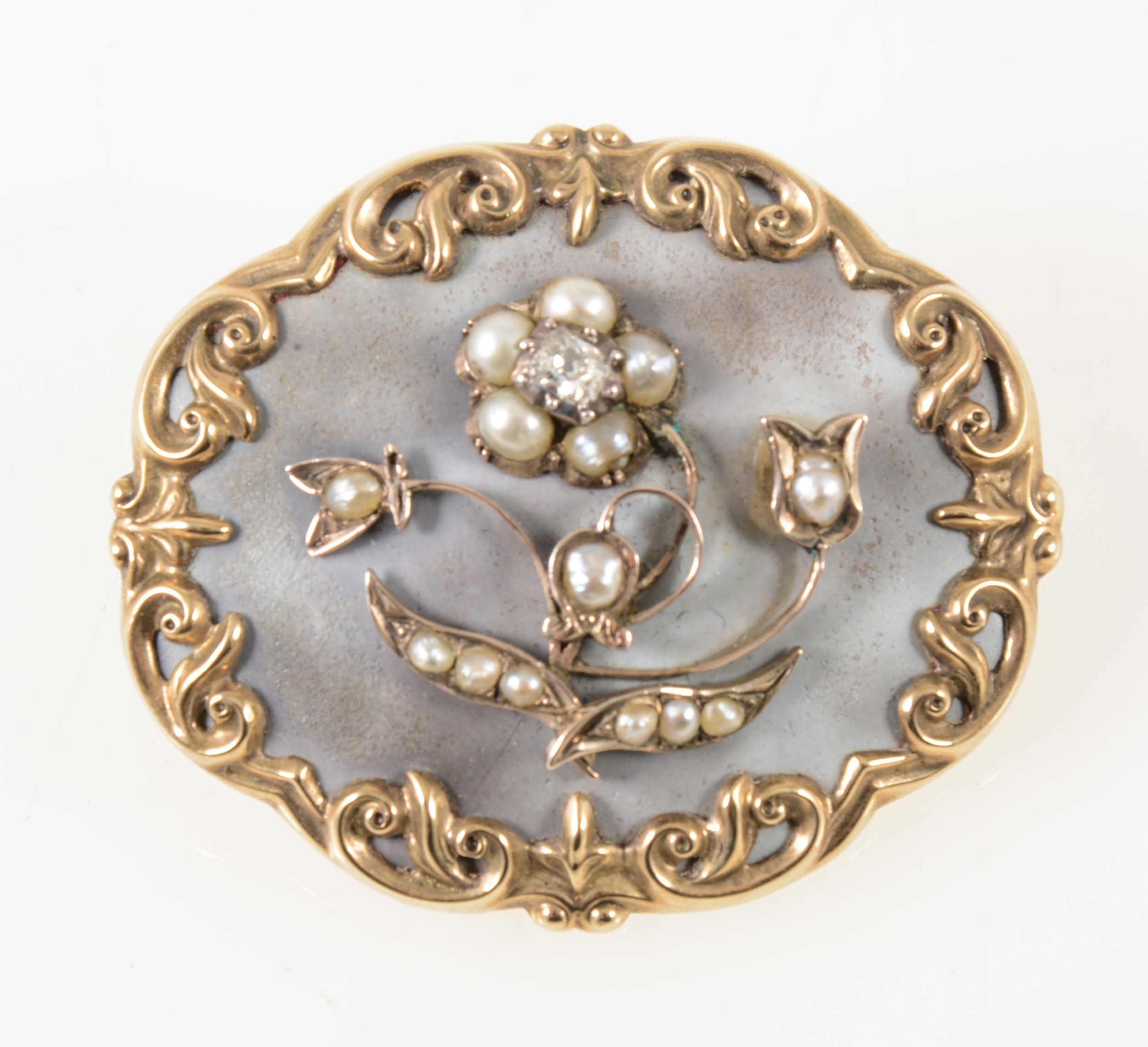 A Victorian mourning brooch.