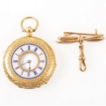 A small yellow metal demi hunter pocket watch with brooch fitting.