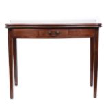 A George III mahogany tea table in the Hepplewhite style