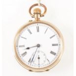A small yellow metal open face pocket watch.