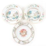A Chinese armorial porcelain soup plate, Qianlong: and a pair of soup plates