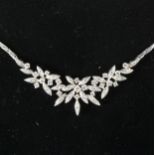 A diamond set necklace.