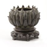 A small Chinese bronze censer, modelled as a Chrysanthemum head