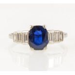 A sapphire and diamond ring.