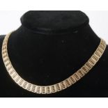 A 9 carat yellow gold five bar gate link necklace.