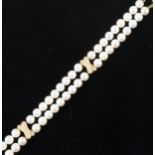 Mikimoto - A two row cultured pearl bracelet.