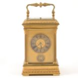 A French gilt metal repeating alarm carriage clock, late 19th century
