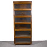 An oak sectional bookcase, Globe-Wernicke Limited, in eight divisions