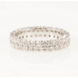 A diamond two row full eternity ring,.