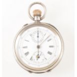 A white metal open face chronograph pocket watch.