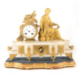 A Louis XVI style gilt metal and onyx mantel clock, 19th century