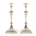 A pair of Edwardian silver candle sticks, William Hutton & Sons Ltd, Sheffield 1910.