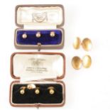 A pair of 9 carat yellow gold chain link cufflinks and dress studs.