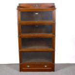 An American walnut sectional bookcase, The Globe-Wernicke Co Limited