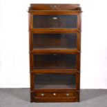 An American walnut sectional bookcase, The Globe-Wernicke Co Limited