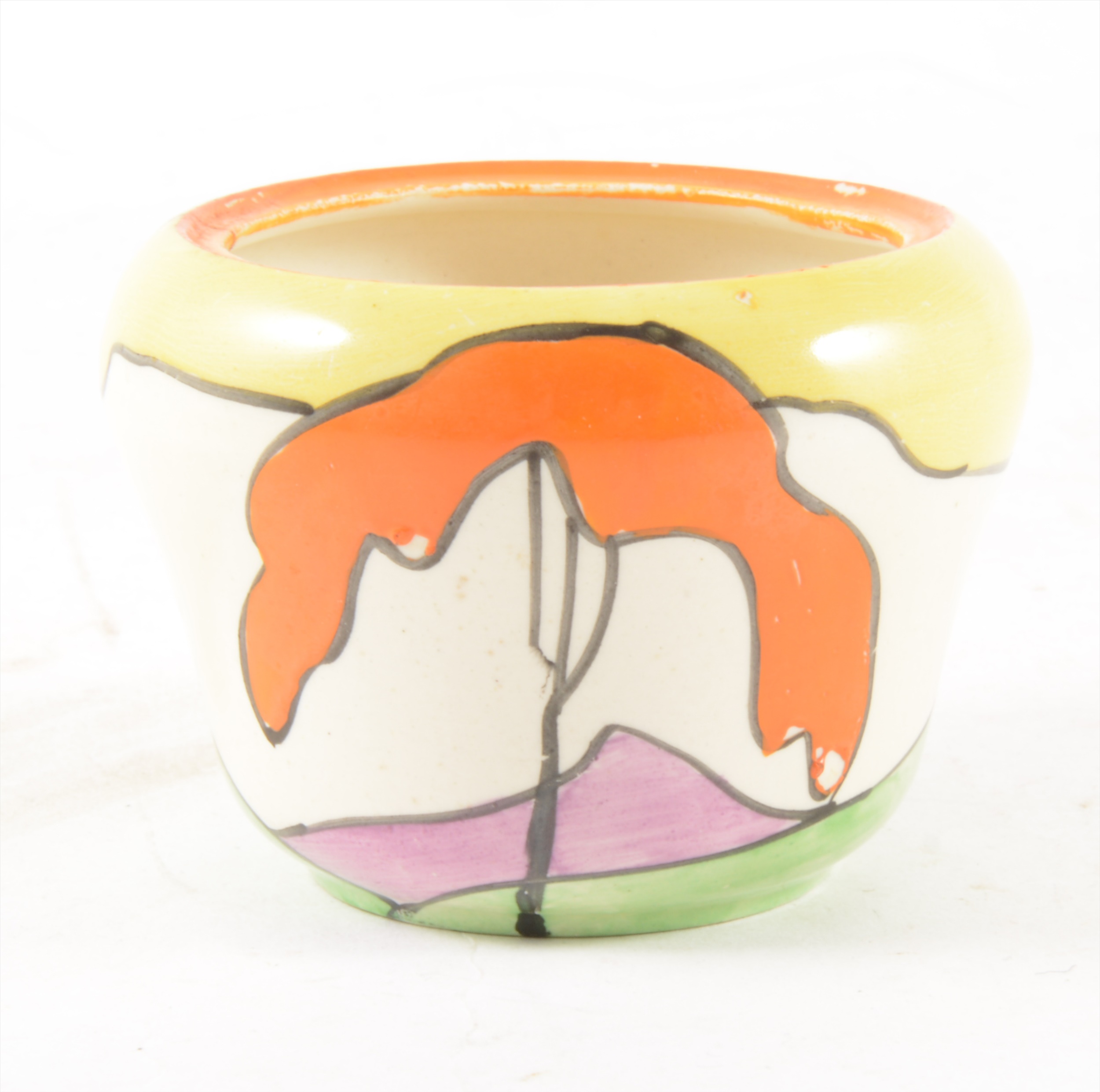 A Clarice Cliff preserve bowl, 'Mountain' pattern, lacking lid, damaged, 6cm.