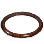 Simulated rosewood oval wall mirror