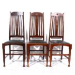 Set of eight walnut Arts & Crafts style chairs
