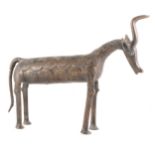 A bronze sulpture of a cow,