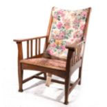 An Edwardian oak easychair