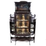 A Victorian ebonised china cabinet