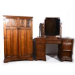 A 1930s oak four-piece bedroom suite; and an oak hall chair