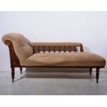 An Edwardian stained walnut chaise longue,