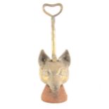 A cast brass doorstop, modelled as a fox head and riding crop