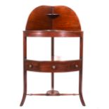 A mahogany corner washstand.