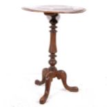 A Victorian stained walnut pedestal table