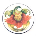 Moorcroft pottery circular dish, Anna Lily, dated '98, diameter 12cm, boxed.