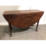 An old oak drop-leaf table