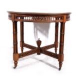 An Edwardian walnut centre table