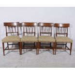 A set of seven Sheraton style mahogany dining chairs