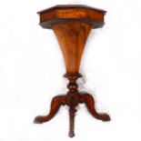 A Victorian walnut trumpet work table