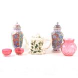 A collection of decorative ceramics and glassware in two boxes.