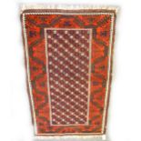 An Afghan rug, and a flatweave mat