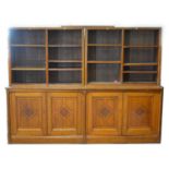 A Victorian Gothic oak bookcase cabinet