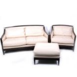 A contemporary dark stained beechwood three-piece lounge suite