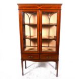 An Edwardian and satinwood banded display cabinet