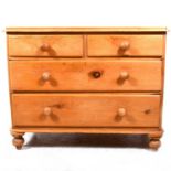 A Victorian stripped pine chest of drawers