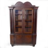 A Victorian oak and mahogany glazed bookcase, adapted