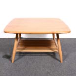 An Ercol coffee table with magazine undertier