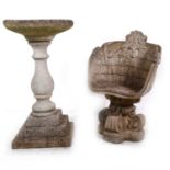 A reconstituted stone garden seat, and a birdbath