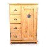 A pine pantry cupboard